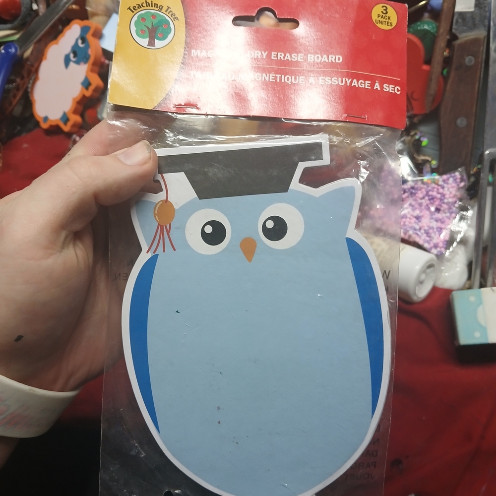 Teaching Tree brand magnetic dry erase board shaped like a graduation owl